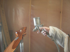 V-2-8 spraying a wood prop